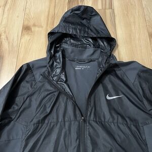Woman's Nike Golf Hooded Windbreaker Sz L Black Full Zip, Triangle Relief Print